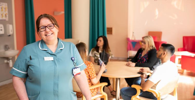 image of nurse at support group