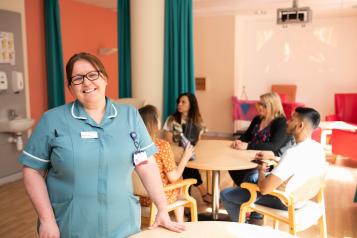 image of nurse at support group