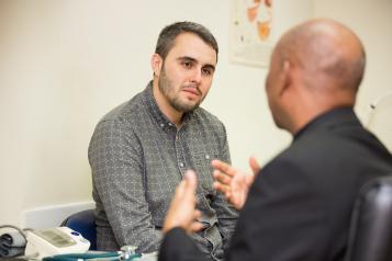 Doctor talking to a patient