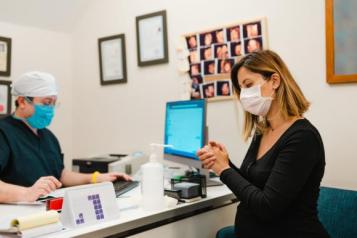 person receiving covid-19 vaccine