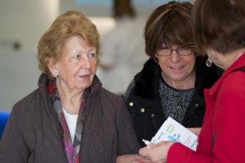 women talking to healthwatch representative